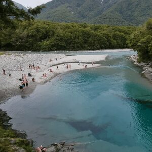 Tourist enjoying the nature of lake  Wanaka in New Zealand.