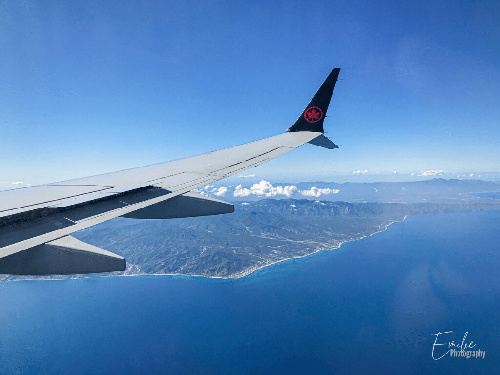 A beautiful view of California from Plane. With a perfect blue sky and ocean.