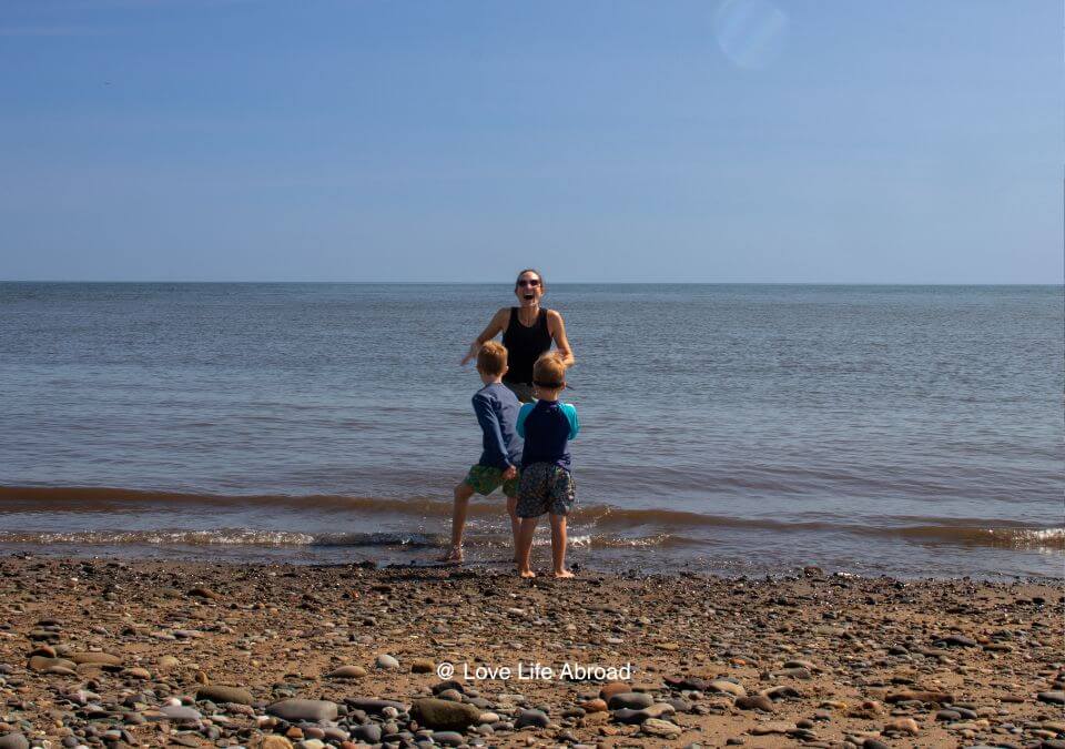 Beach time by Miscou Island Lighthoouse