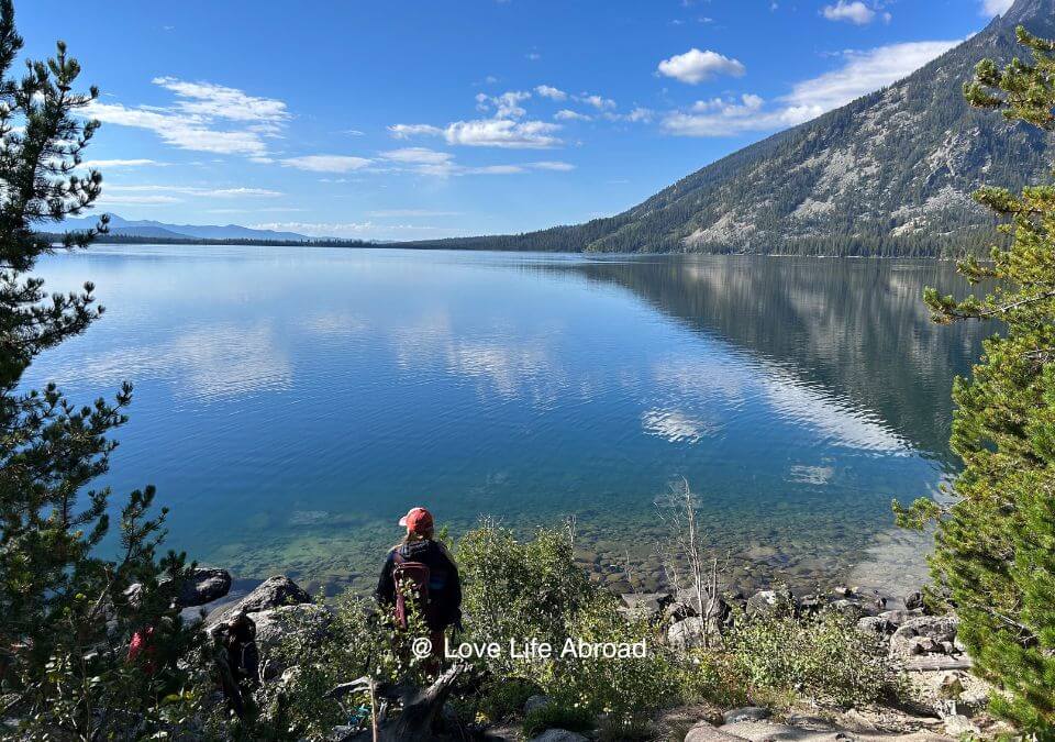 Taking a little pause by Jenny Lake after a long hike