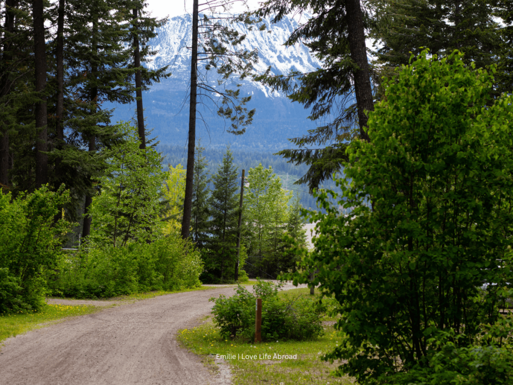 Walking on the trails at the Golden Municipal Campground seeing the mountains from far.