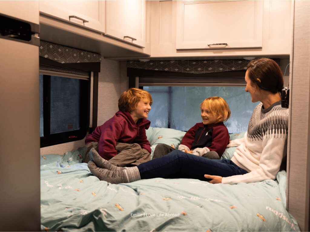 Chatting before bed in the cozy double bed of the RV 